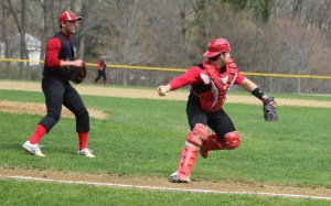 Mac Short prepares to throw to first