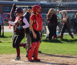 Meghan Stanton finishes her run around the bases