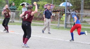 Pitcher Vicki Allman throws to first baseman Carley Siemasko