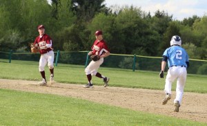 Caleb Stott starts a double play