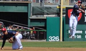 Kevin Nolan (SS) jumps and throws
