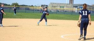 Triton shortstop Rylie Culverwell throws to first