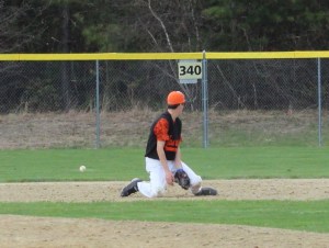 Ball goes through second baseman Liam Sullivan