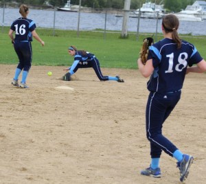 Infield grounder gets by second baseman Kylie Gilroy