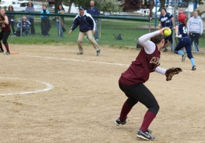 Meg Stanton sets to throw out baserunner Shannon Lyons