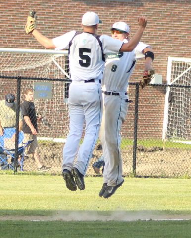 Ryan Kuchar and Bobby Barry celebrate the win over Lynnfield