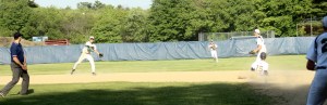 Shortstop Pat Beaton throws to first for the final out