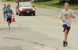 Dorn Scalfani (131) on the way to catching Josh Weisbach (127) for 8th place