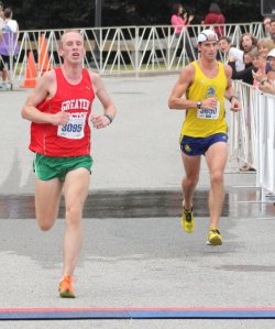 battle for 9th in the 10 mile between Anthony Walsh (left) and Ian Nurse (right)