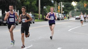 Nathaniel Webber (2446), Joe Santo (2936), and Stephen Leonard (1327) chase the leaders in the 5K