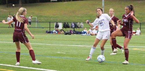 Makenna Cerney gets into position to score the first Newtown goal