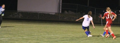 Sophomore Kristen Huntress sets to rip home the game-winner with 23 seconds left.