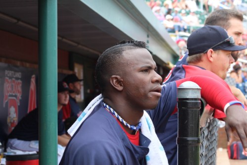 Boston Red Sox prospect Rusney Castillo looks out from the Portland Sea Dogs dugout
