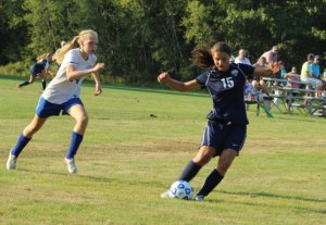 Lindsey Cole chased by freshman Danica Chadwick
