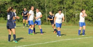 Players react to the goal scored by #4 Elaine Cavalieri