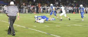 Nick Samuelson ends the first half with a hard hit on JaiQuan McKnight