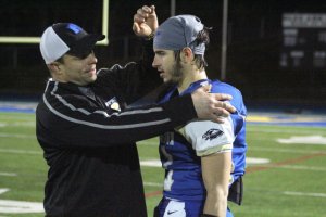 Coach Steve George and Ethan Carpenter