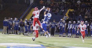 Bryan Acevedo (3) and Ethan Carpenter (1) sky for a pass