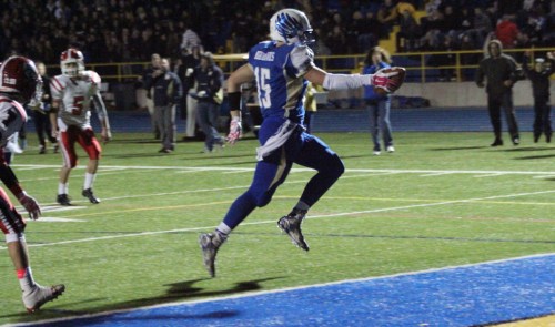Julian Dunn crosses the goal line into the Connecticut state record book with his 48th touchdown reception