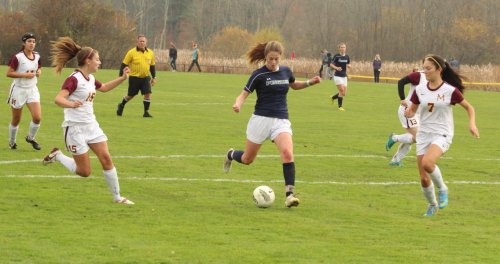 Kerri Zerfoss splits Kaitlyn Dodos and Kayla Bolduc to get a good look and the first Pingree goal