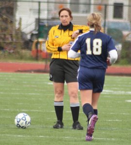 Mackenzie Chiudini gets a yellow card