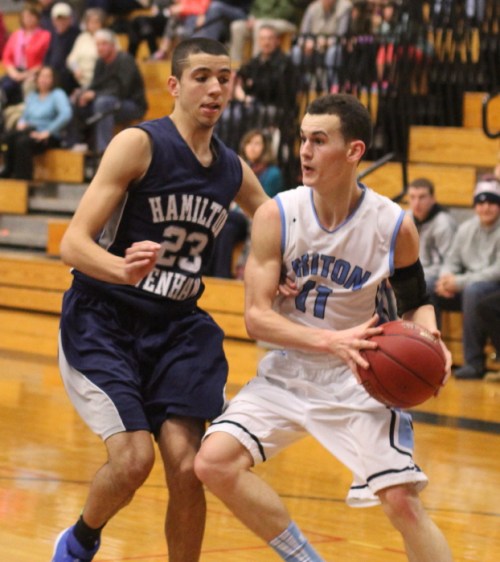 Max Zegarowski (14 points) defends Nick Venora (12 points)