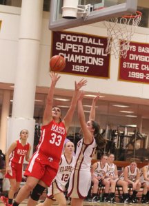 Stephanie Mini gets to the basket