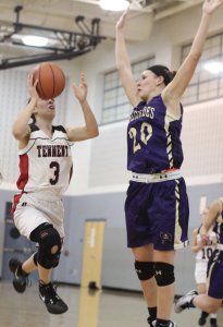 Angie Pomponio runs into 5-11 shot blocker Karlee Krchnavi