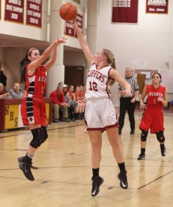 Morgan Johnston (12) blocks a shot