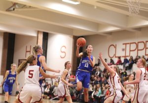 Maya Spence (17 points) gets airborne in the lane