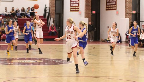 Emily Pettigrew (15 points) passes ahead to teammate Morgan Johnston (21 points)