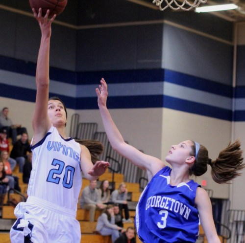 Tessa LaFrance (16 points) gets two over Cayla Durkee in the first quarter