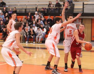 Alex Militello (19 points) looks to pass