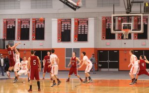 Drew Muniz gets fouled by Sam Traicoff with six seconds left in the 2nd overtime