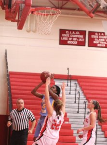 Nia Fogle (14 points) in for two