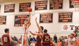 Robbie Glavin (16 points) launches a jump shot