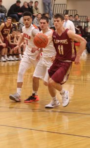 Mike Shay (#11) tries to outrun Jake Long and Chris Remy