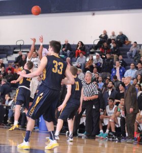 Julio Vicente gets off a three in OT