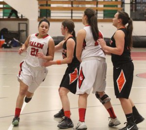 Brianna Rodriguez (15 points) cuts through