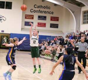 Kelsi McNamara puts up a three