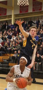 EJ Perry looks to block