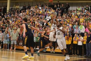 Tevin Charles (15 points) hits a big 3rd quarter 3-pointer in front of the Andover student section