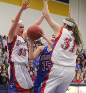 Tara Burke and Brittany Roche lock down Katie Valcich