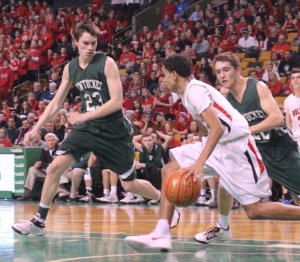 Will Sullivan and Jeff Porter try to double-team Noah Fernandes