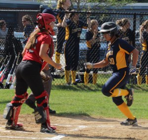 Annika Han scores the first Lynnfield run