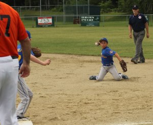 2B Jake Miceli gets an out from his knees