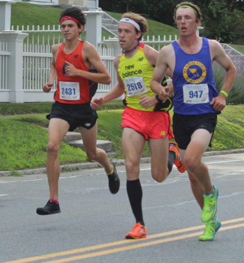 Nick Carleo, Pat Fullerton, and Jacob Johns close together one mile into the YK 5K