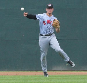 Shortstop JaCoby Jones throws to first