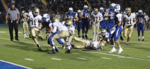 Jared Pearson carries tacklers to the end zone