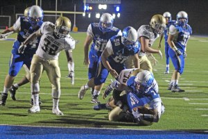 Jared Pearson dives into the end zone